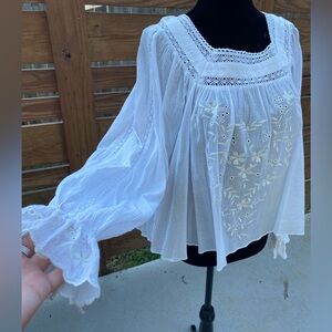 a loves a white boho blouse